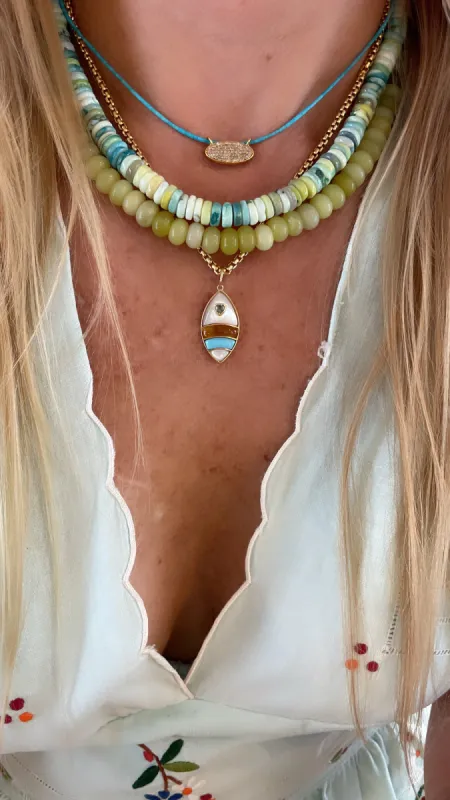 surfboard pendant sold by Theodosia