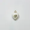 puffy white agate heart pendant with moonstone sold by Theodosia