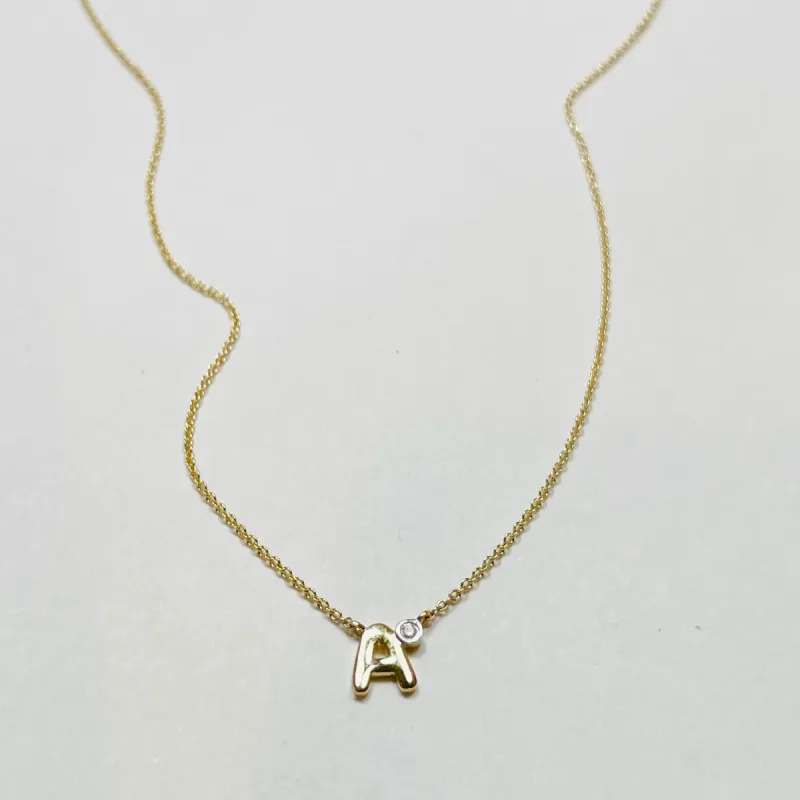 initial with bezel diamond necklace sold by Theodosia