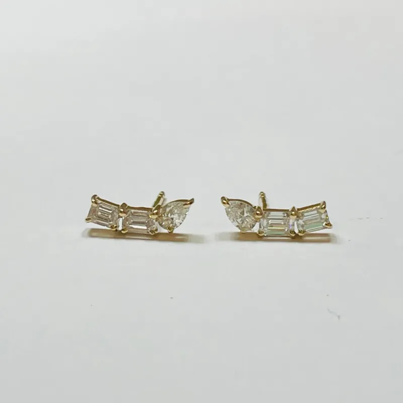14 k gold 3 stone diamond arc sold by Theodosia