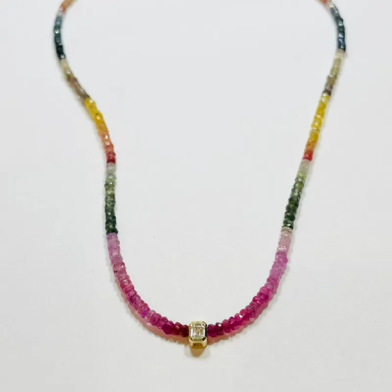 sapphire necklace with emerald cut bezel set diamond sold by Theodosia