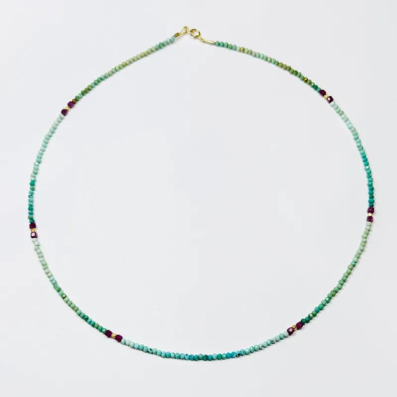 delicate shaded turquoise necklace with ruby block and gold nuggets sold by Theodosia