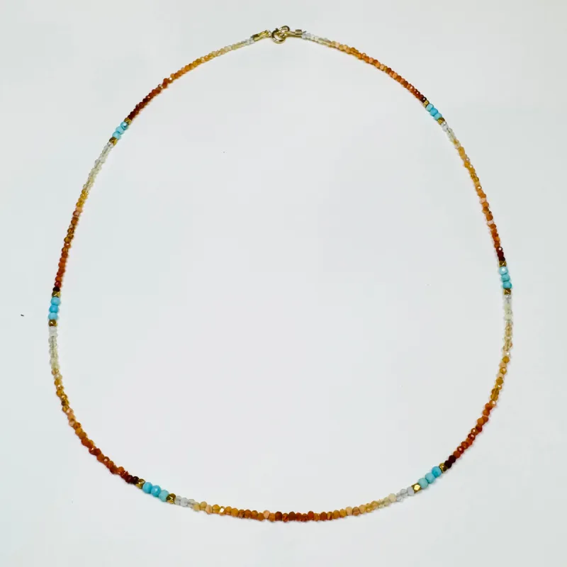 delicate shaded fire opal necklace with turquoise and gold nuggets sold by Theodosia