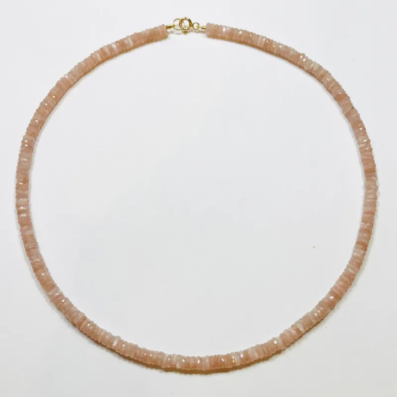 solid peach moonstone heishi necklace sold by Theodosia