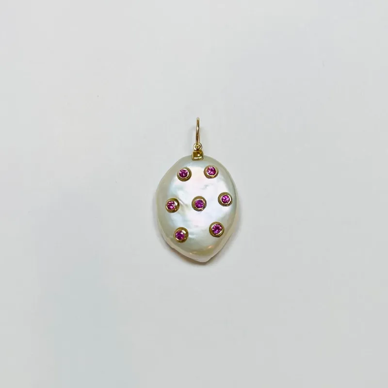 baroque pearl pendant with bezel set pink sapphires sold by Theodosia