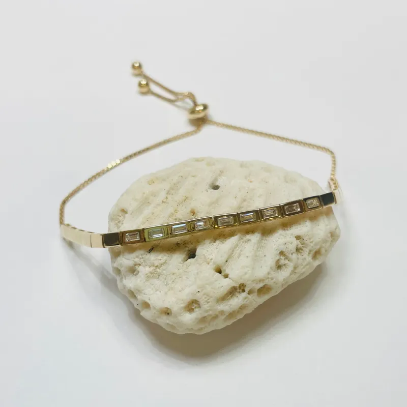 gold bezel baguette bracelet sold by Theodosia