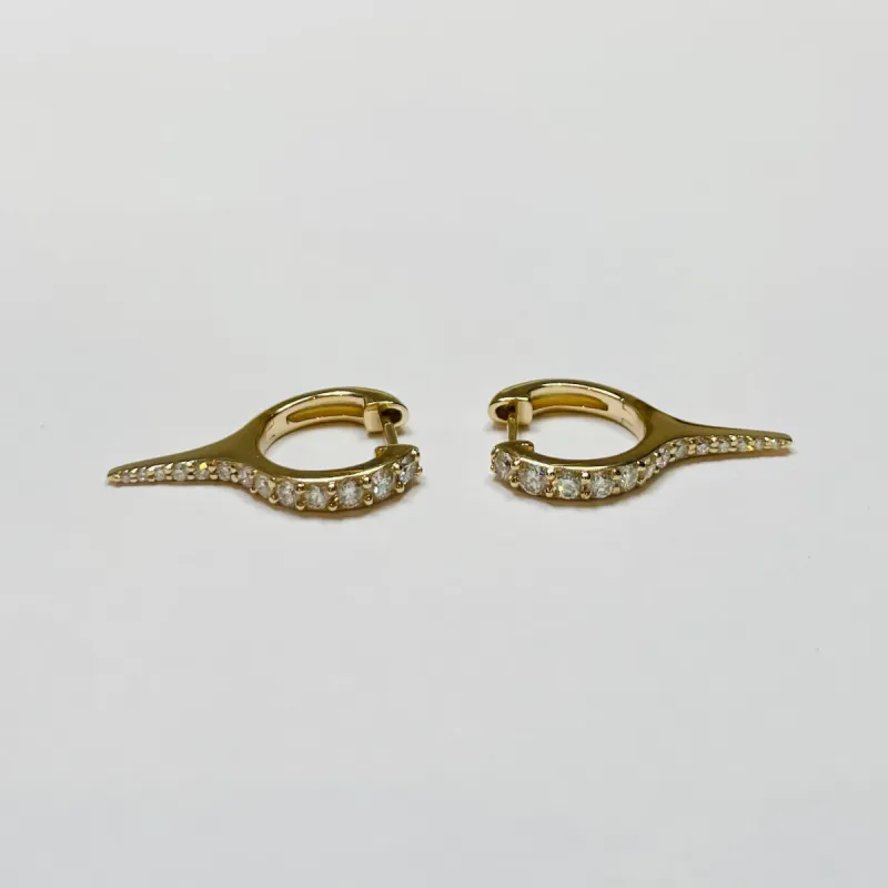 pavè diamond gold spike huggie sold by Theodosia