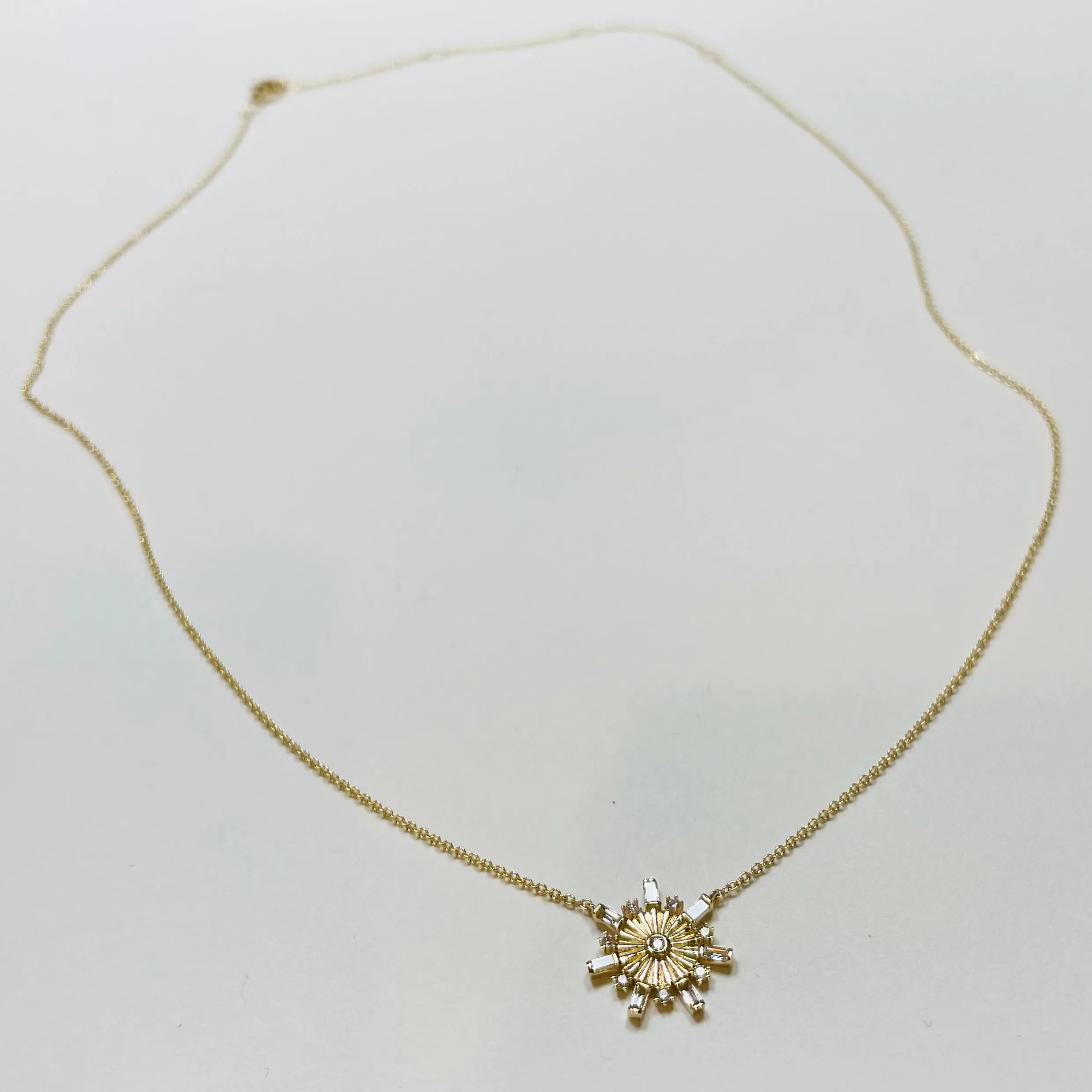 snowflake necklace sold by Theodosia
