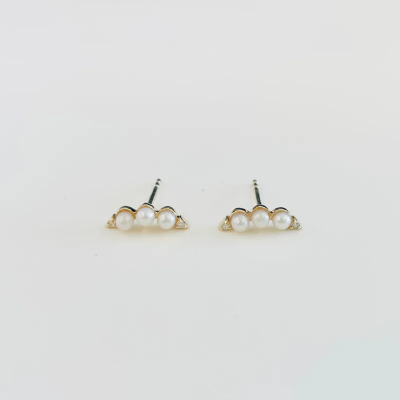 pearl bar arc studs sold by Theodosia