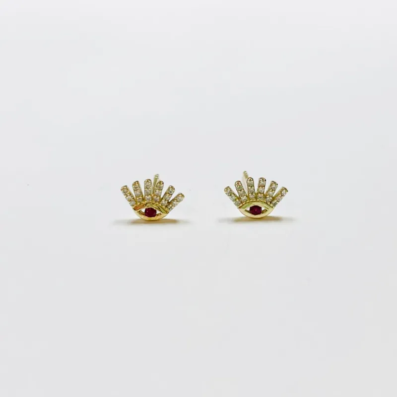 ruby and diamond evil eye studs sold by Theodosia