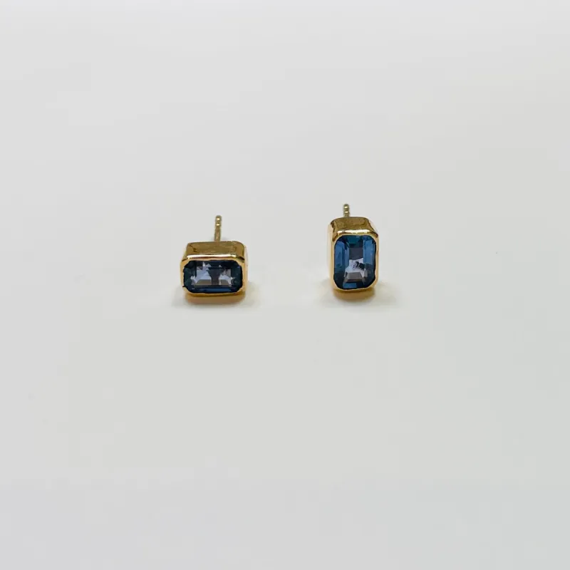 blue sapphire emerald cut studs sold by Theodosia
