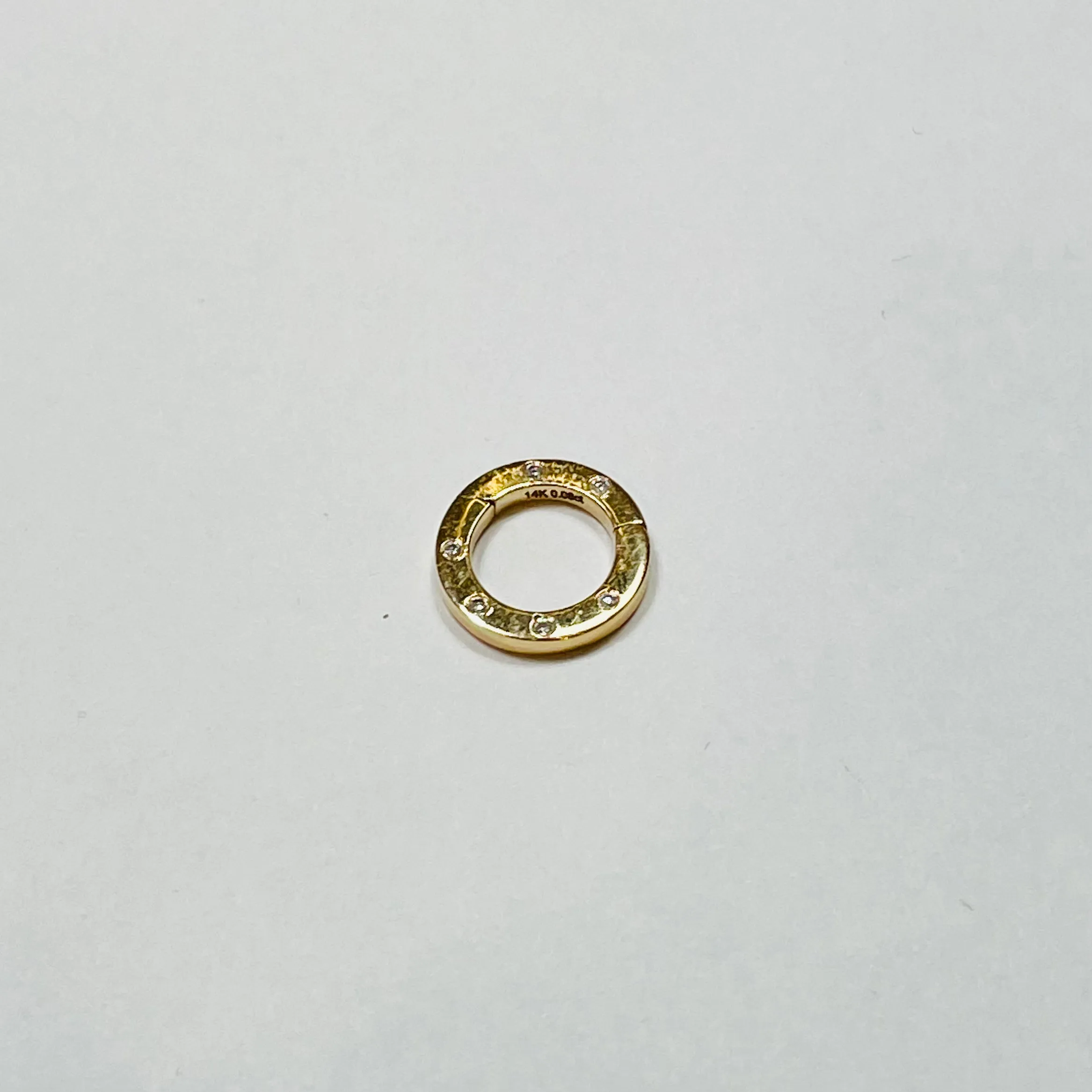 circle diamond studded connector sold by Theodosia