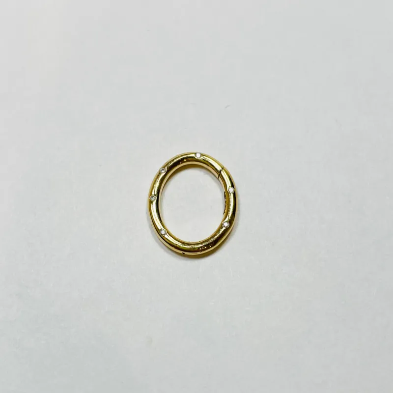 oval diamond studded connector sold by Theodosia