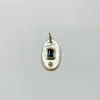 mother of pearl with sapphire pendant sold by Theodosia