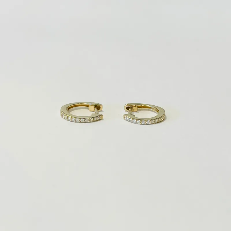 pave diamond huggies sold by Theodosia