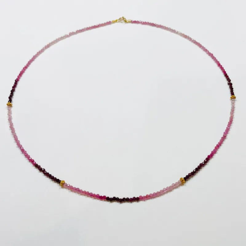 delicate shaded ruby necklace with 14 k gold beads sold by Theodosia