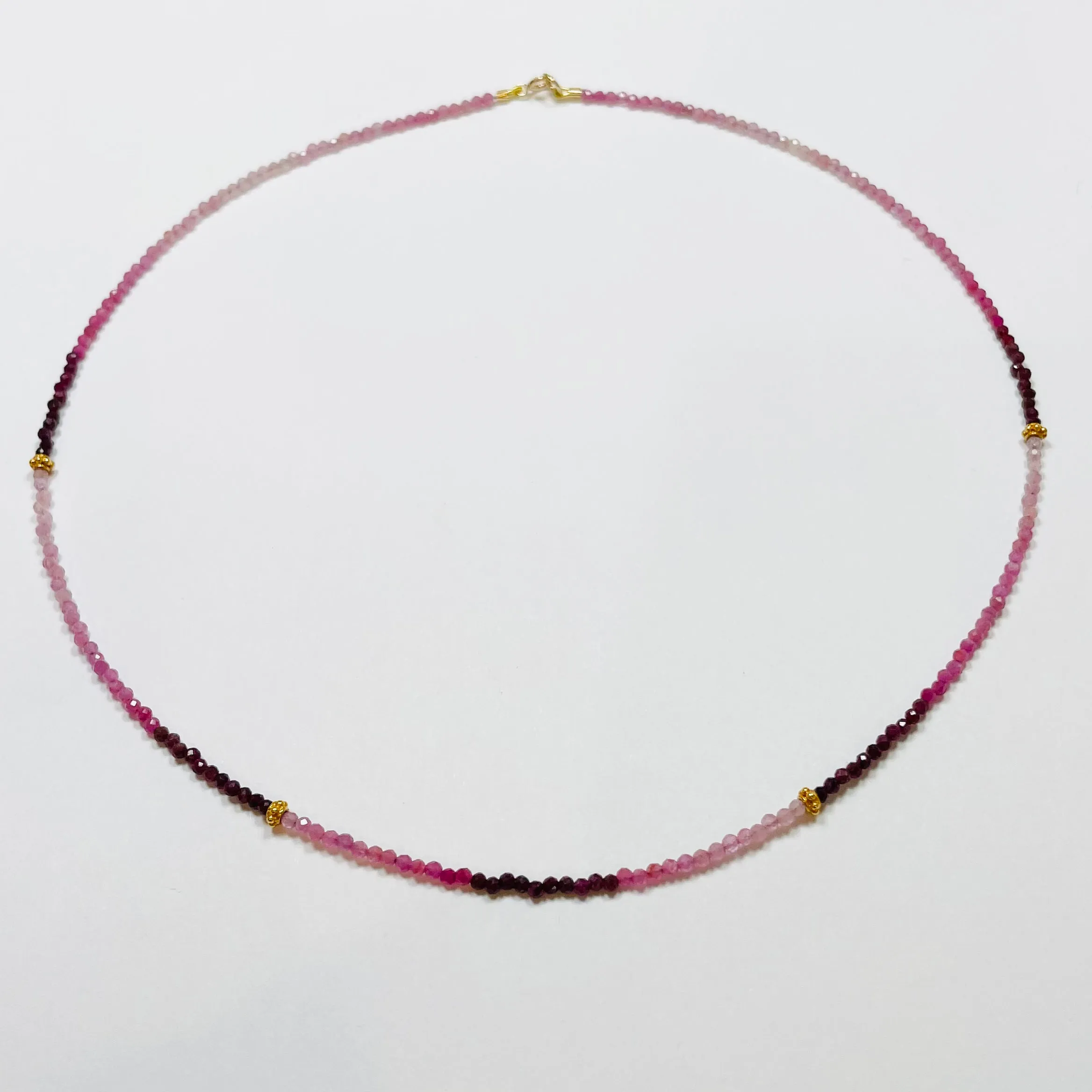 delicate shaded ruby necklace with 14 k gold beads sold by Theodosia