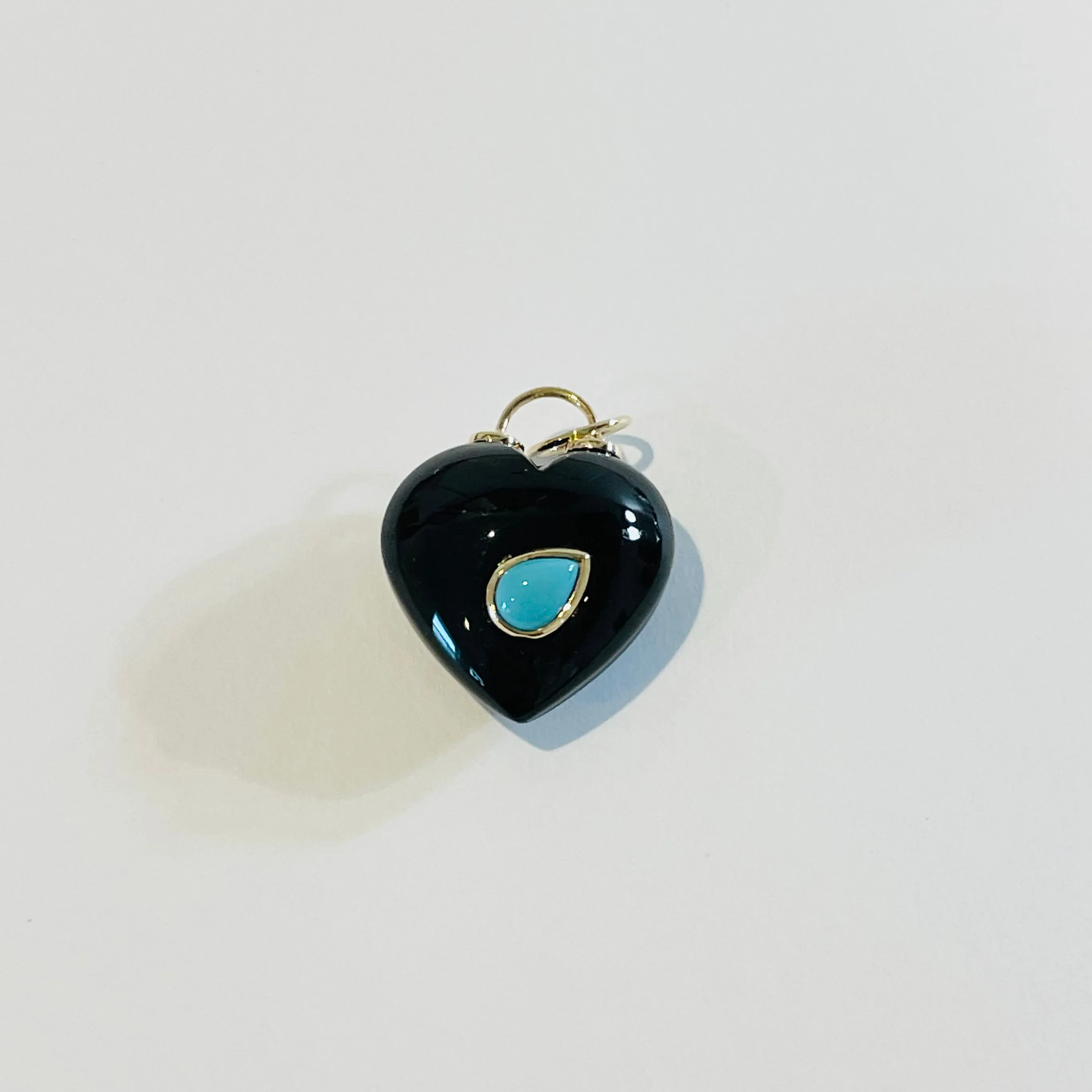 puffy onyx heart pendant with turquoise sold by Theodosia