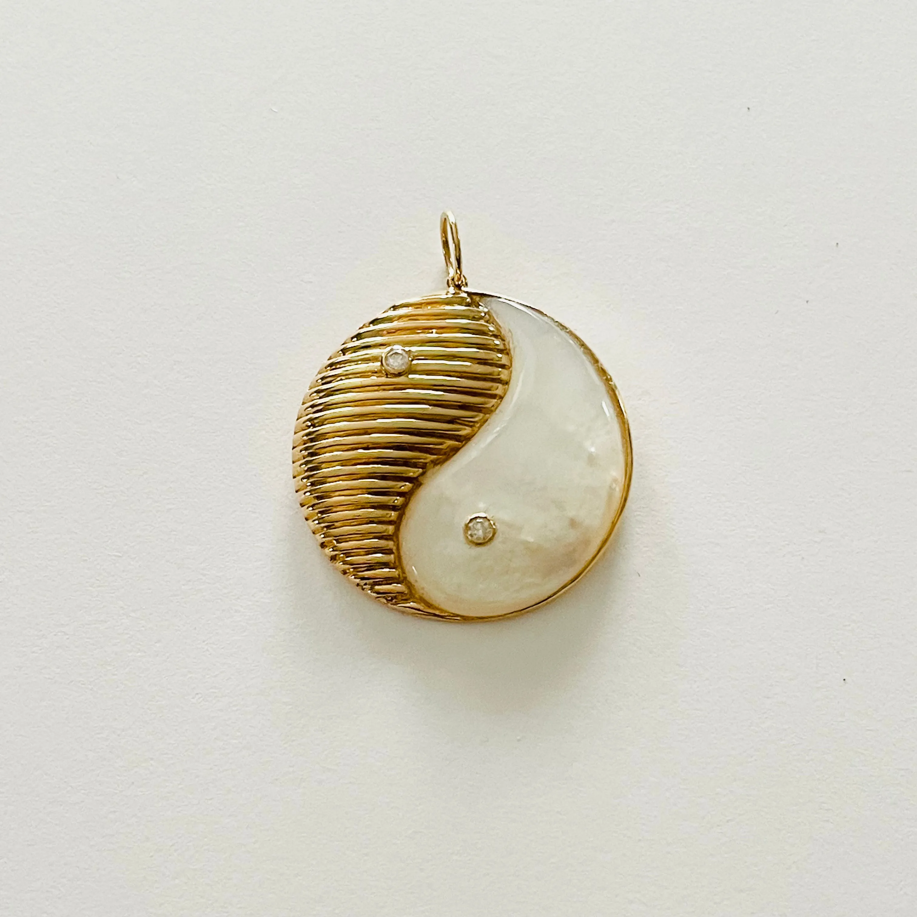 ying yang pendant sold by Theodosia