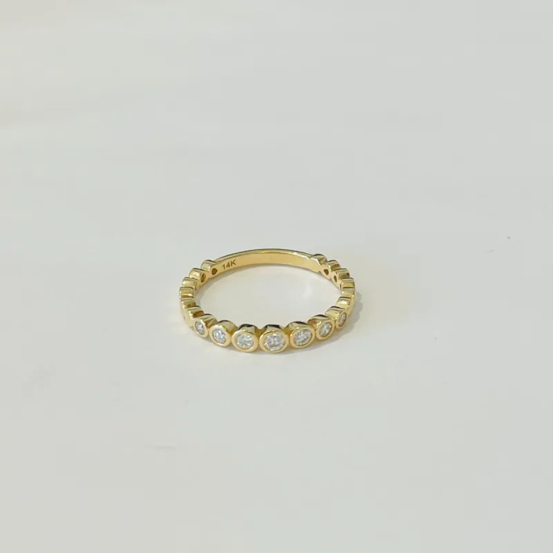 bezel set diamond band sold by Theodosia