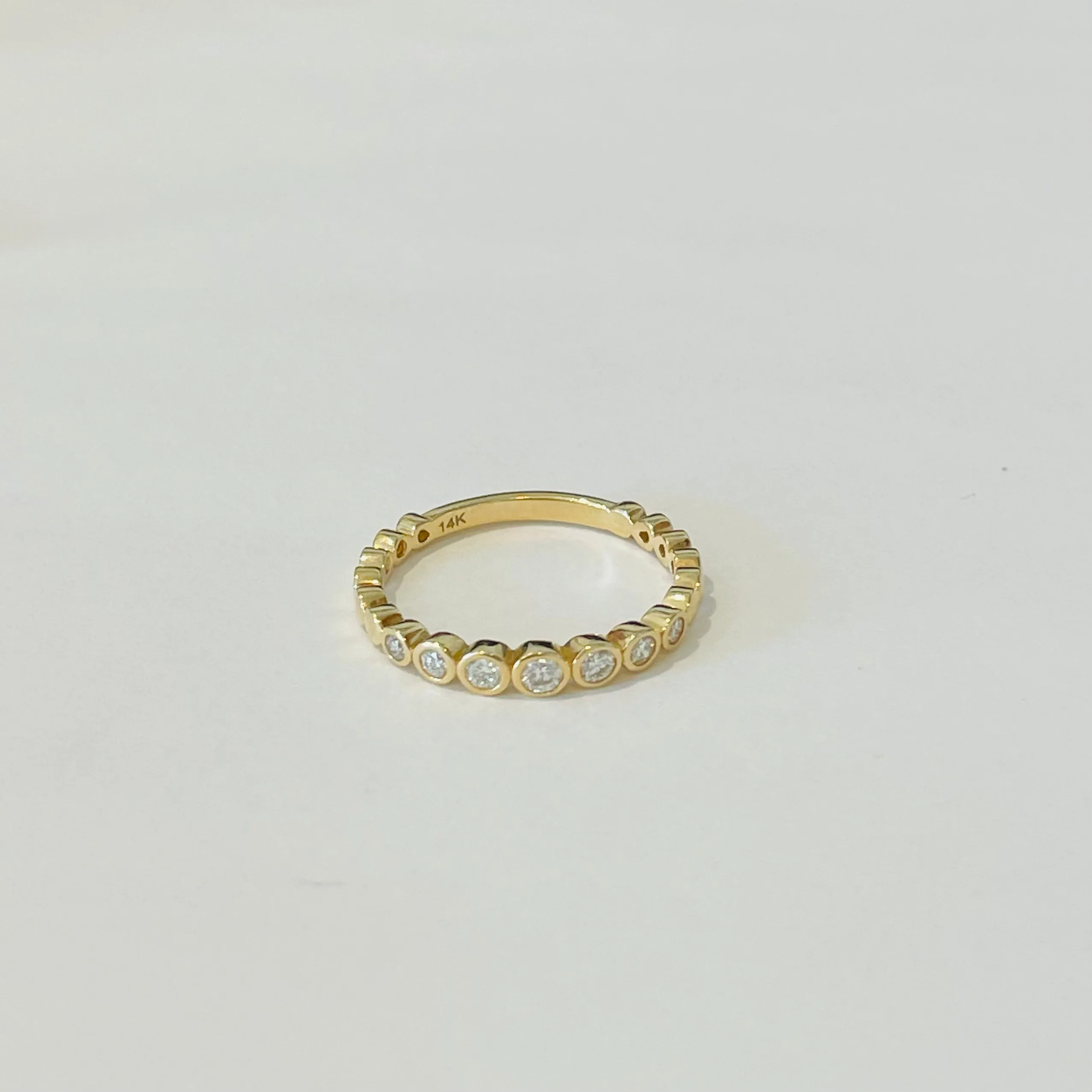 bezel set diamond band sold by Theodosia