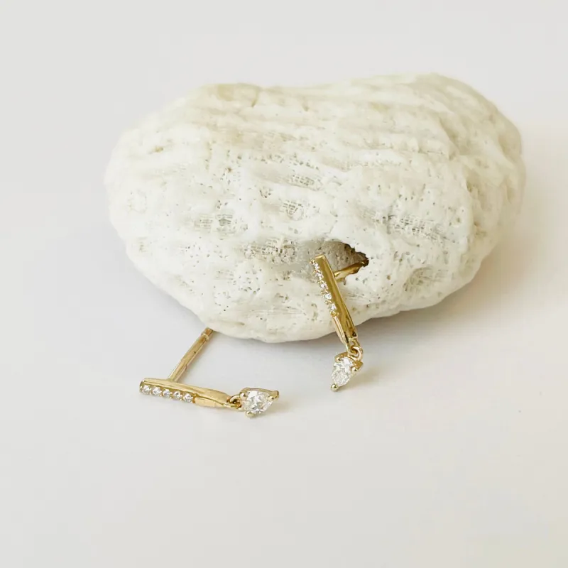 dangle diamond bar studs sold by Theodosia