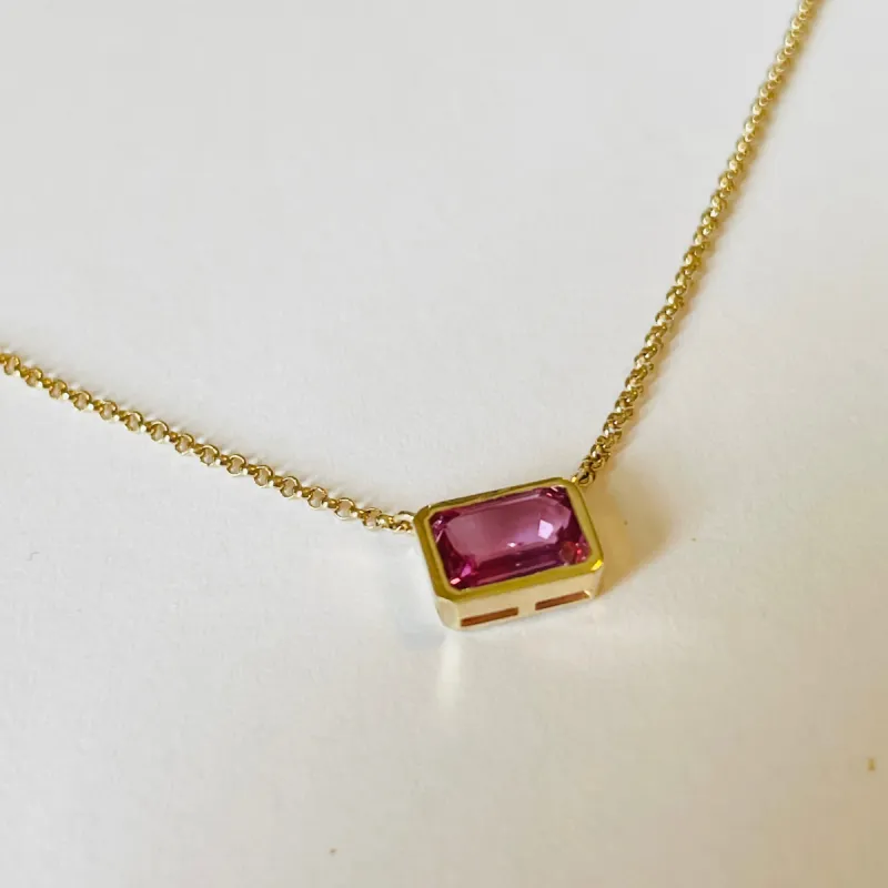 bezel set pink sapphire on 14 k gold chain sold by Theodosia