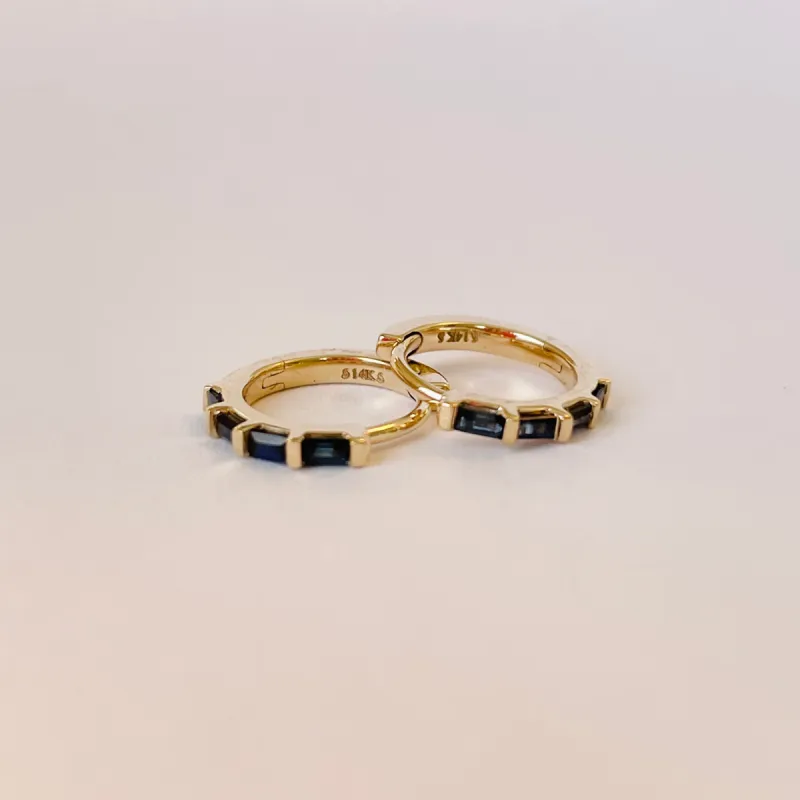 sapphire baguette huggies sold by Theodosia