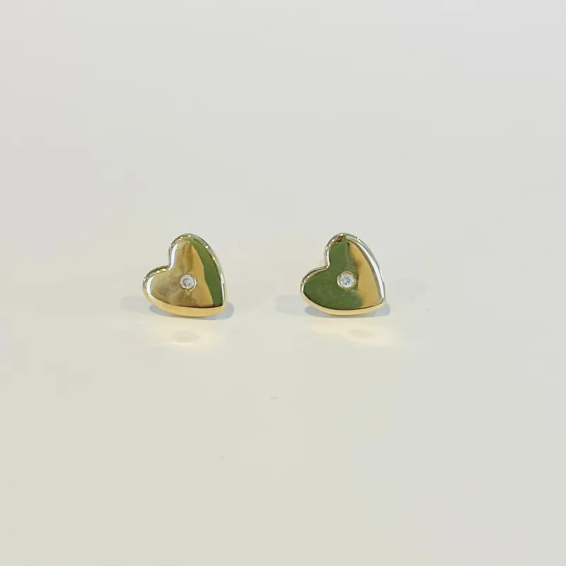 diamond center heart studs sold by Theodosia