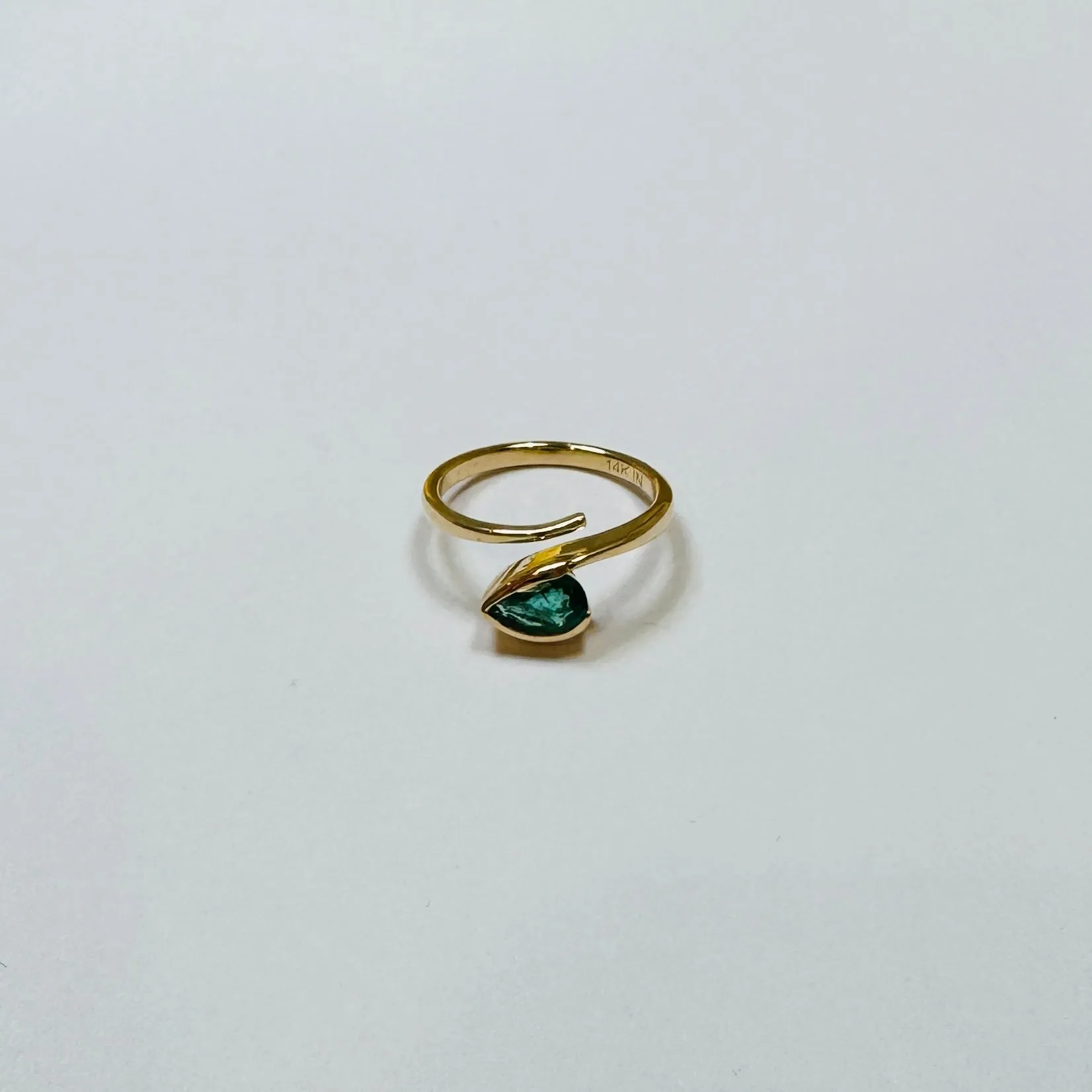emerald wrap ring sold by Theodosia