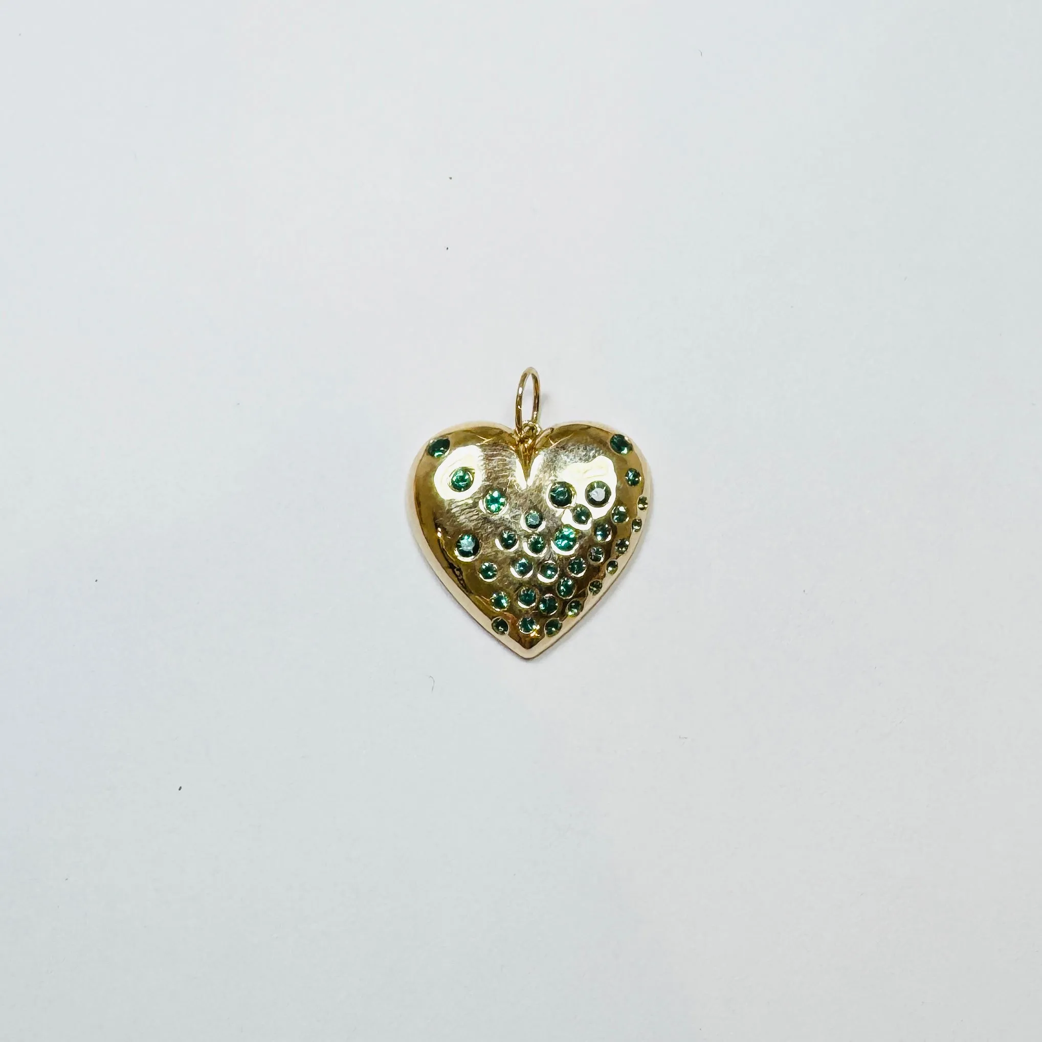 gold heart pendant with emeralds sold by Theodosia
