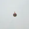 confetti disc pendant sold by Theodosia