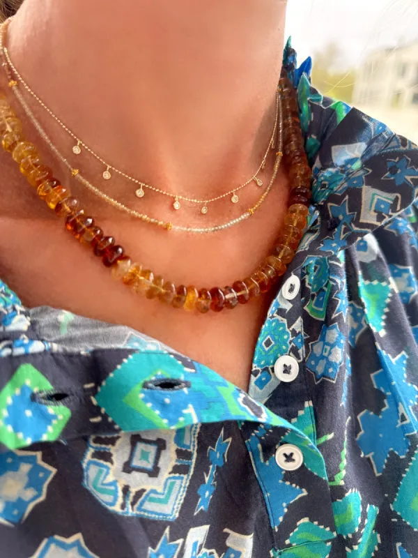 delicate sapphire with 14 k gold beads sold by Theodosia