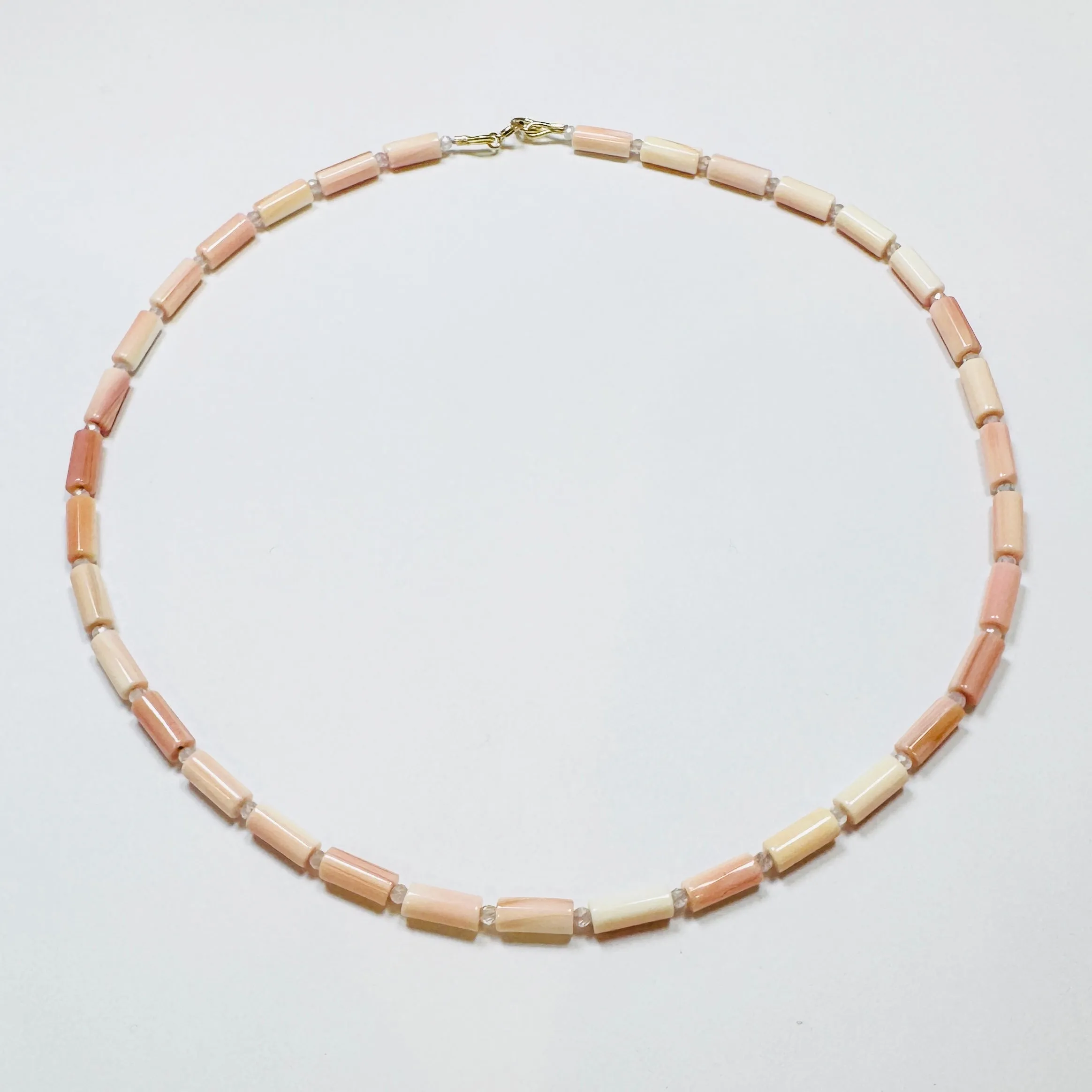 tube pink conch necklace sold by Theodosia