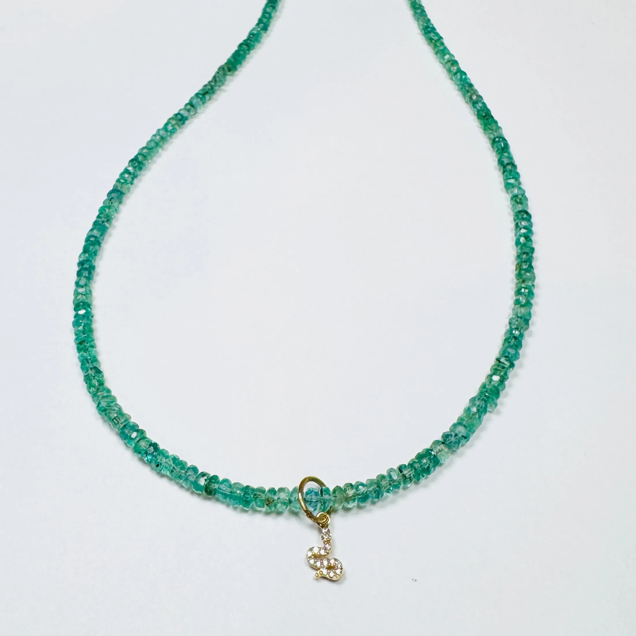 delicate emerald necklace with diamond snake charm sold by Theodosia