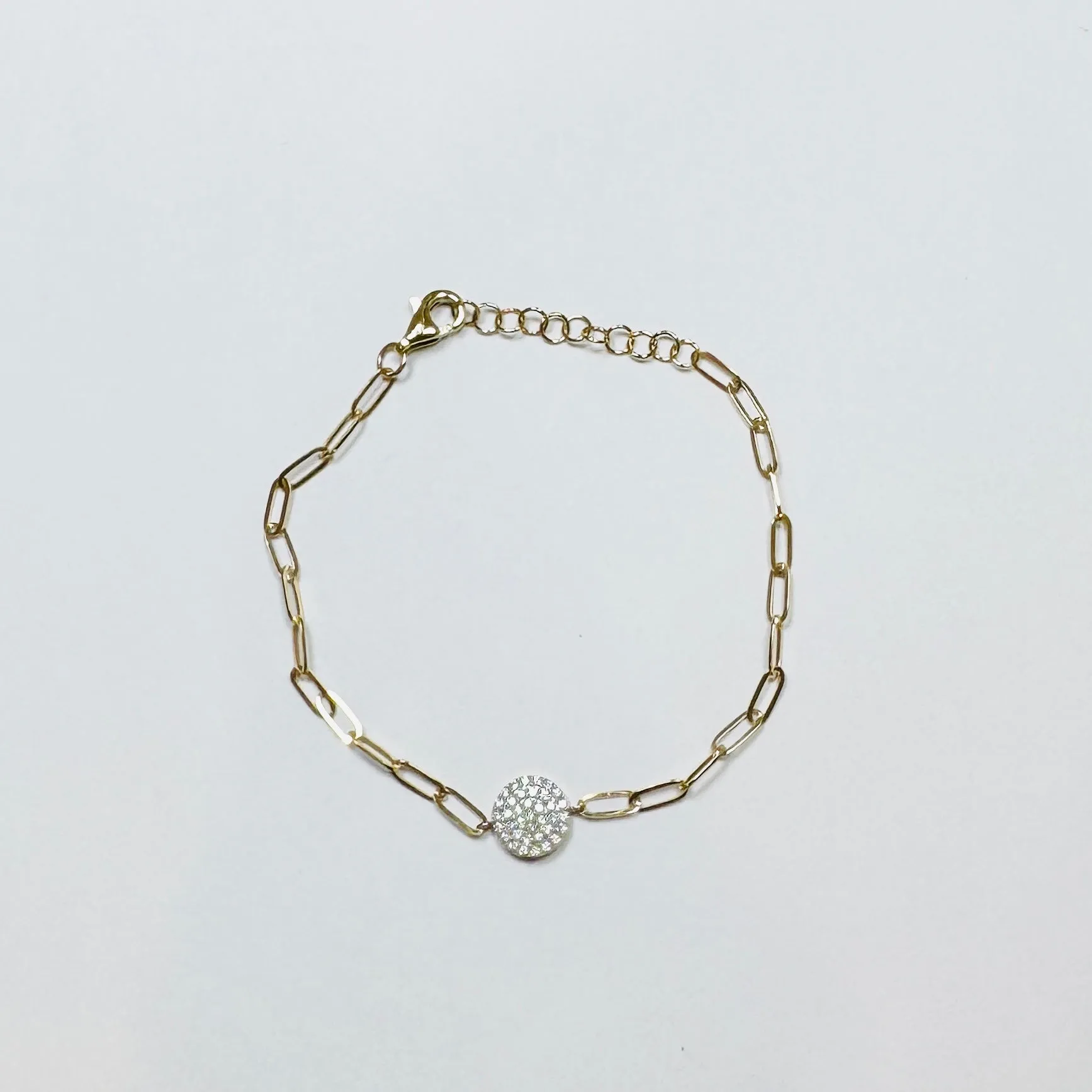 diamond disc on paperclip bracelet sold by Theodosia