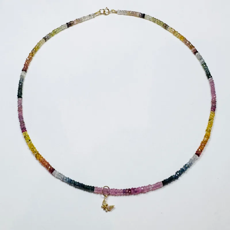 delicate shaded sapphire necklace with diamond butterfly charm sold by Theodosia