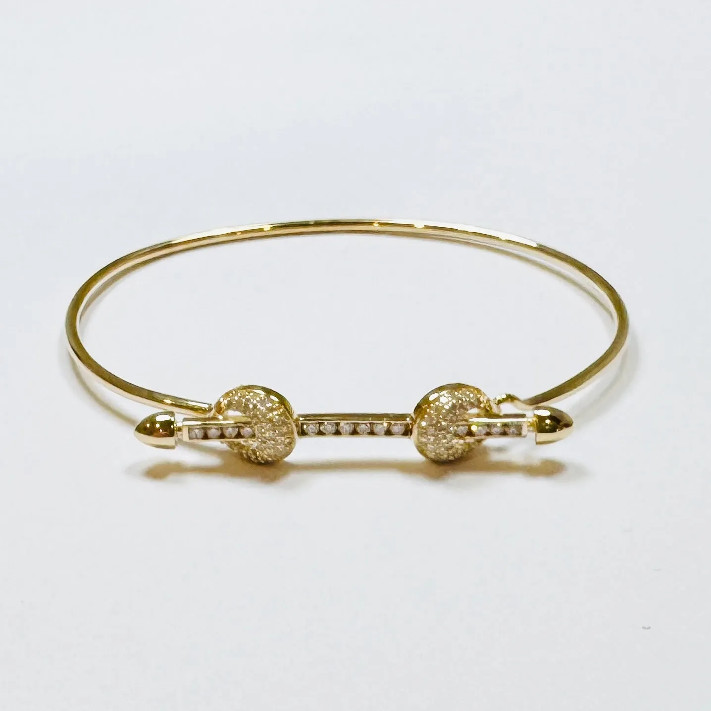 lovers knot bangle sold by Theodosia