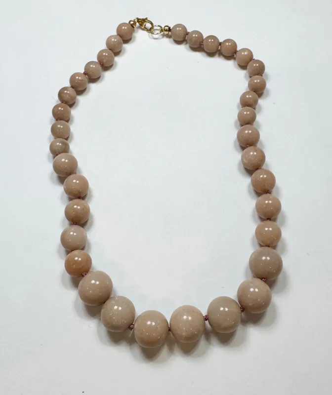 knotted gumball peach agate necklace sold by Theodosia
