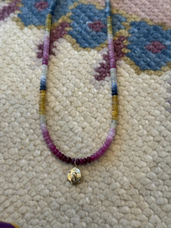 cowboy hat on sunset sapphire sold by Theodosia