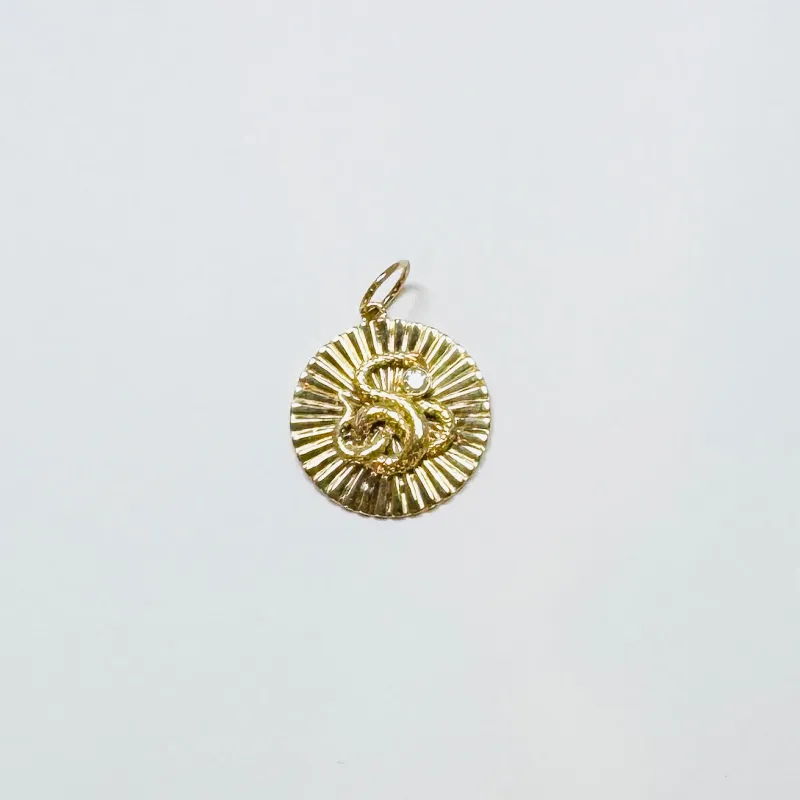 snake fluted disc pendant sold by Theodosia