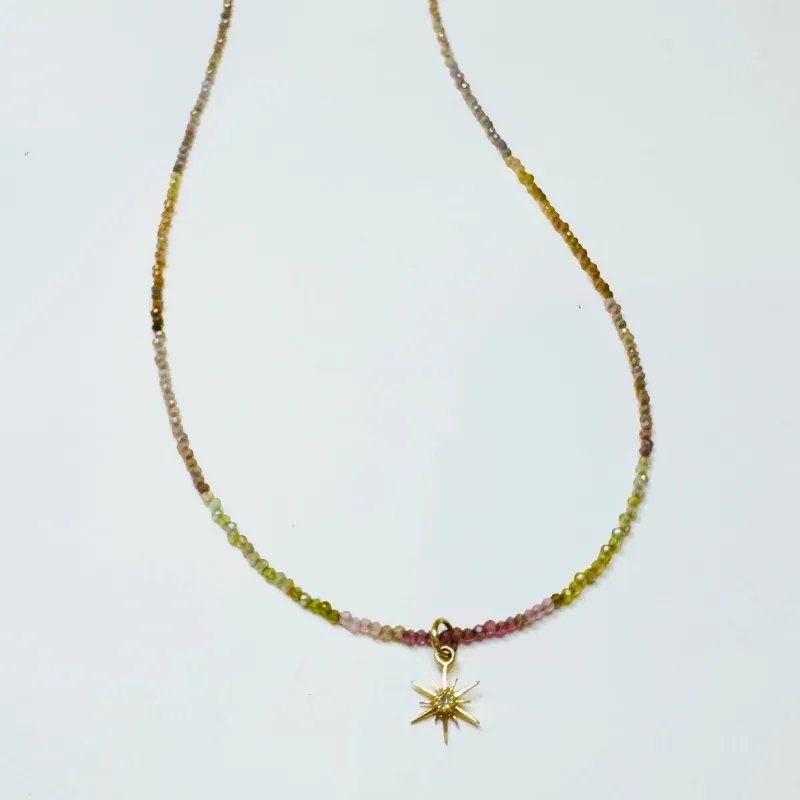delicate shaded spinel necklace with diamond burst charm sold by Theodosia