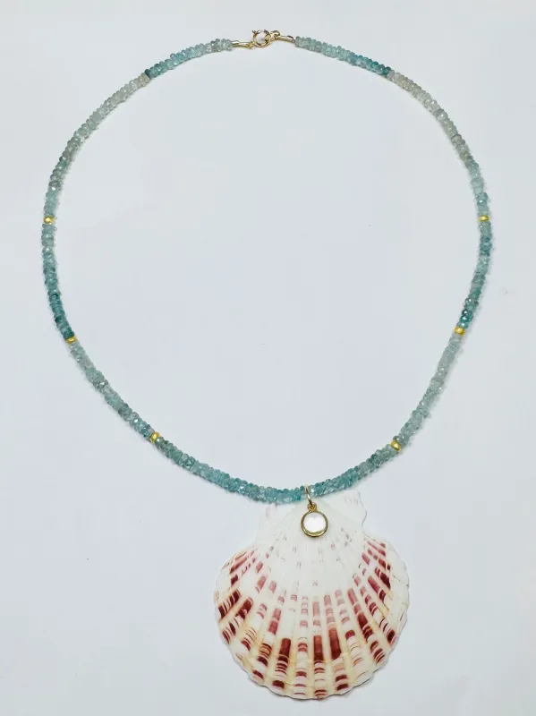 blue zircon necklace with shell pendant sold by Theodosia