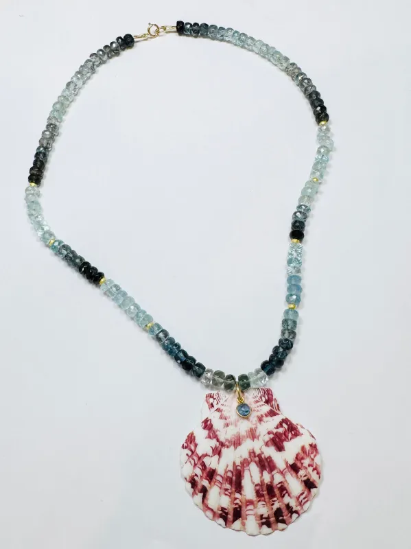 Hessonite garnet necklace with shell pendant sold by Theodosia