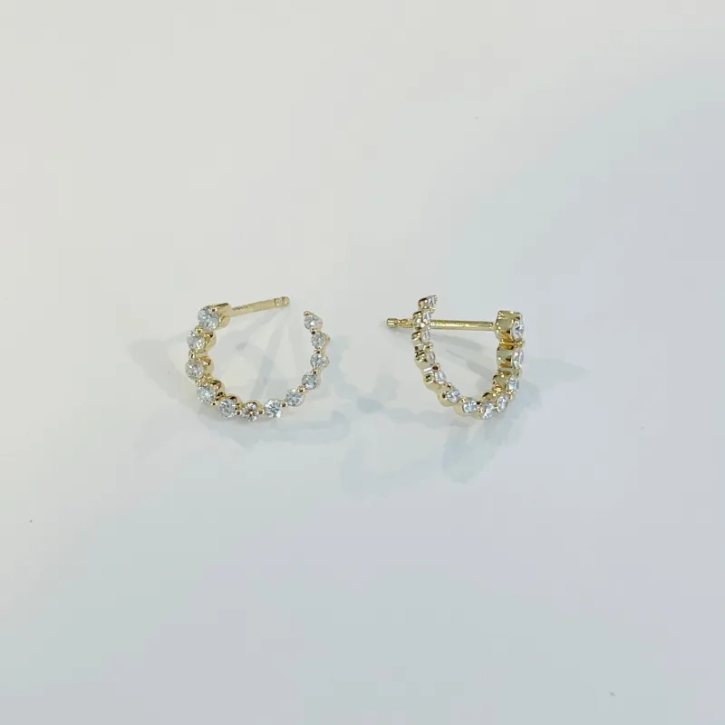 front to back spiral diamond ear cuff sold by Theodosia