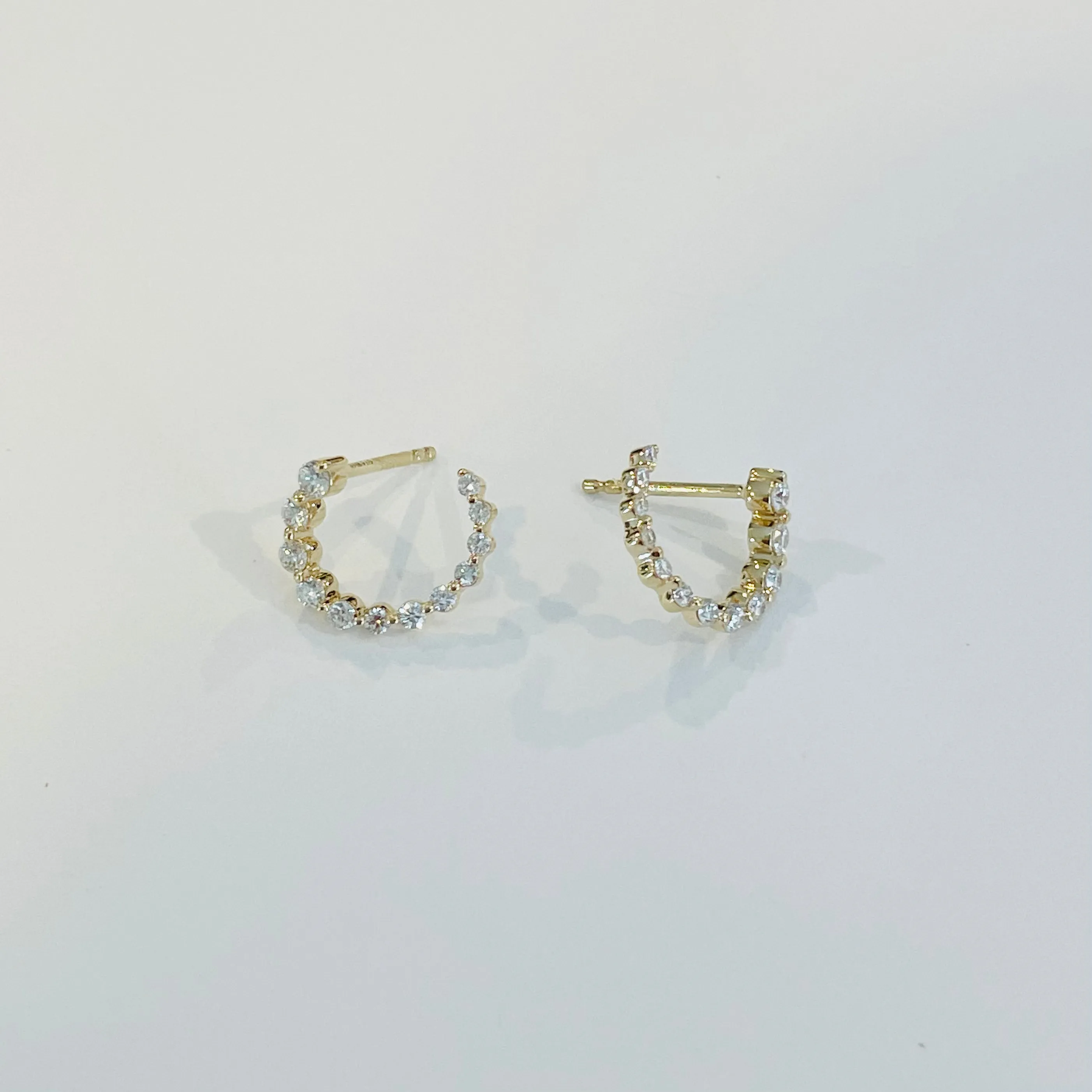 front to back spiral diamond ear cuff sold by Theodosia