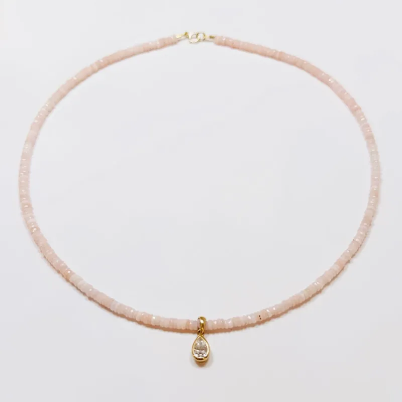 pink opal heishi necklace with pear diamond sold by Theodosia