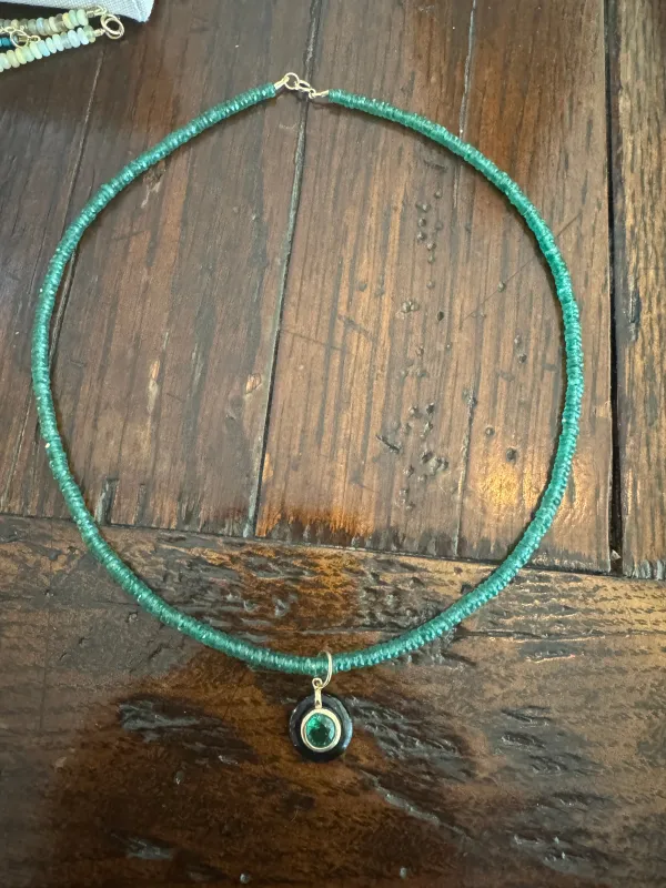 Emerald button on heishi sold by Theodosia