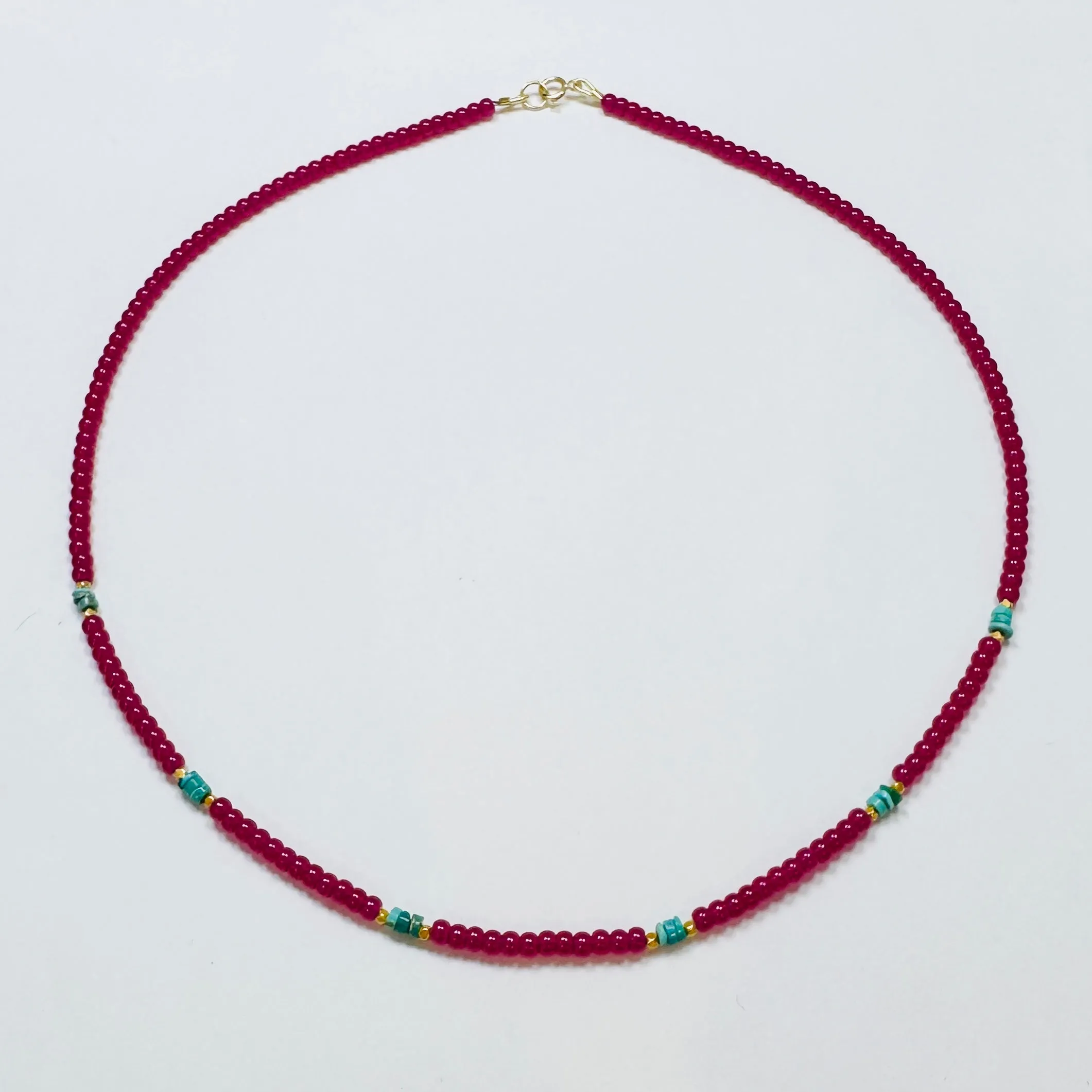 smooth ruby and turquoise necklace with gold nuggets sold by Theodosia