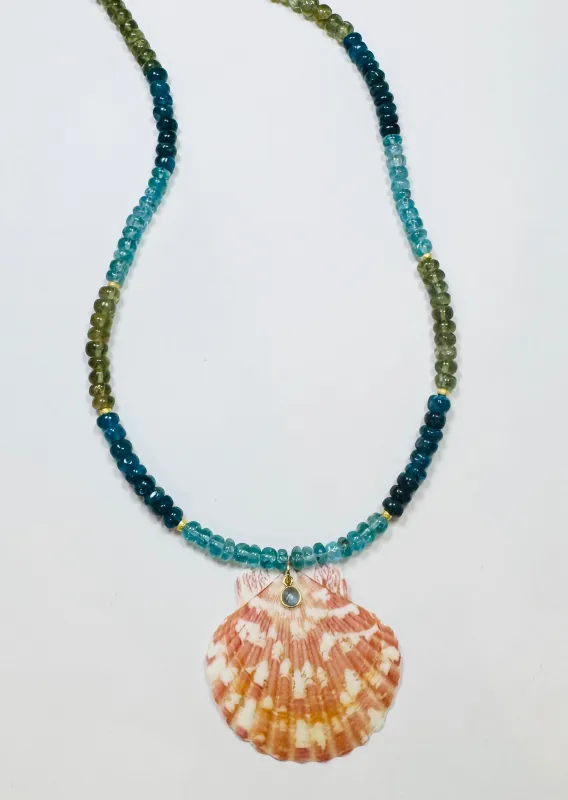 aquamarine and hessonite garnet necklace with shell pendant sold by Theodosia